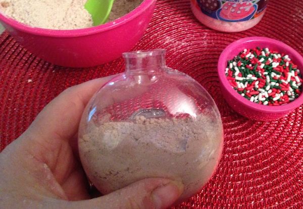 Fill ornament with hot cocoa mix
