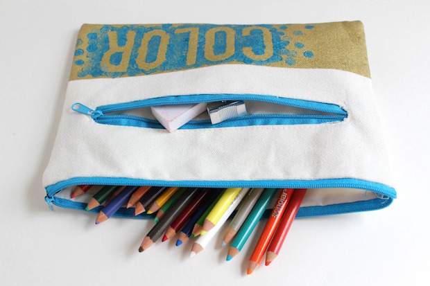 DIY stenciled pencil pouch with supplies from the Target dollar spot
